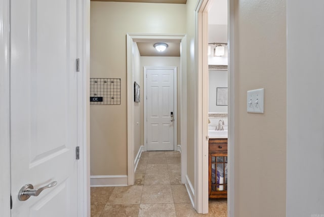 5526 Palisades Cv, Benton, AR 72019 - hall with a sink and light tile patterned floors