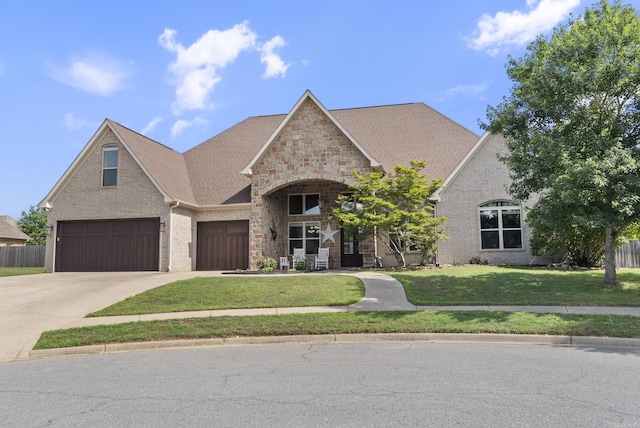 5526 Palisades Cv, Benton, AR 72019 - view of front of home with concrete driveway, an attached garage, and brick siding