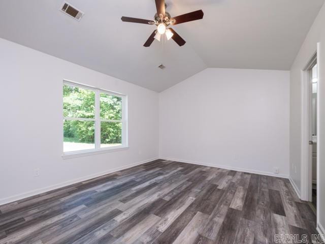 1121 Stewart St, Benton, AR 72015 - bonus room featuring vaulted ceiling, a ceiling fan, and dark wood-style flooring