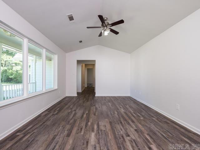 1121 Stewart St, Benton, AR 72015 - empty room featuring lofted ceiling, dark wood-type flooring, and ceiling fan