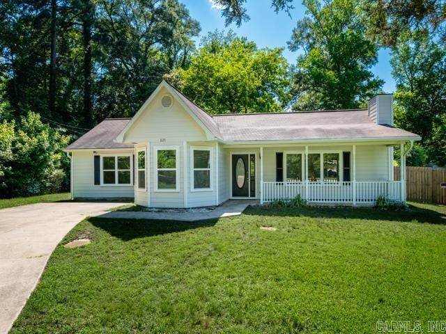 1121 Stewart St, Benton, AR 72015 - ranch-style home featuring a porch, driveway, and a chimney