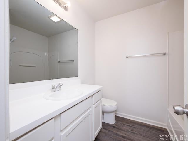 1121 Stewart St, Benton, AR 72015 - full bath featuring vanity, wood finished floors, and  shower combination