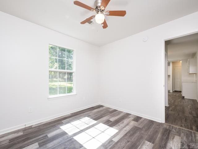1121 Stewart St, Benton, AR 72015 - unfurnished room featuring wood finished floors and a ceiling fan