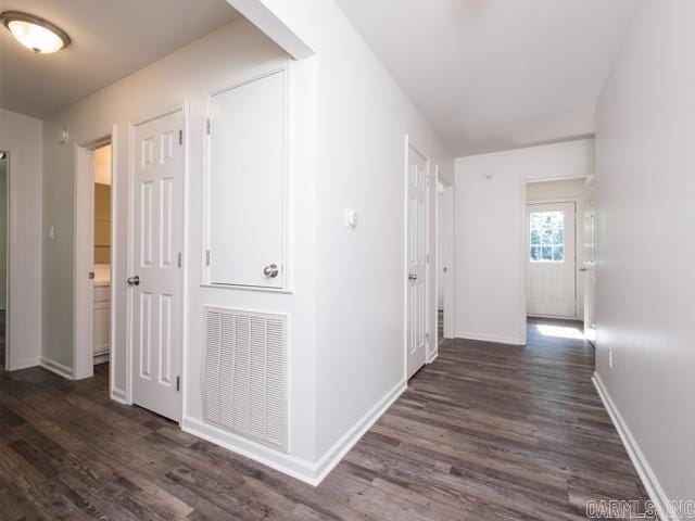 1121 Stewart St, Benton, AR 72015 - hallway with dark wood-style floors