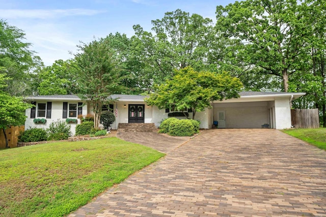 308 Bellaire, Hot Springs, AR 71901 - view of front facade with decorative driveway, french doors, and an attached carport