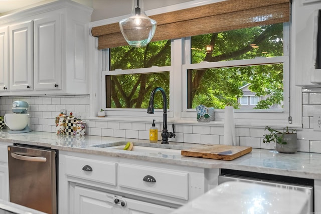 308 Bellaire, Hot Springs, AR 71901 - kitchen with dishwasher, backsplash, white cabinets, and plenty of natural light