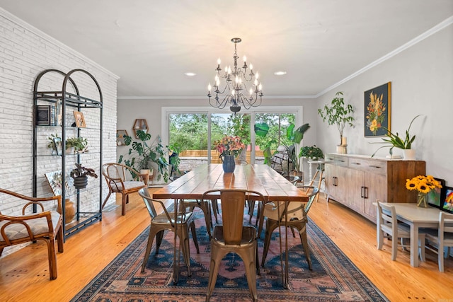 308 Bellaire, Hot Springs, AR 71901 - dining room featuring light wood-type flooring, a chandelier, ornamental molding, and recessed lighting