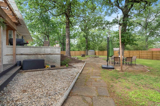 308 Bellaire, Hot Springs, AR 71901 - fenced backyard with a shed and a patio