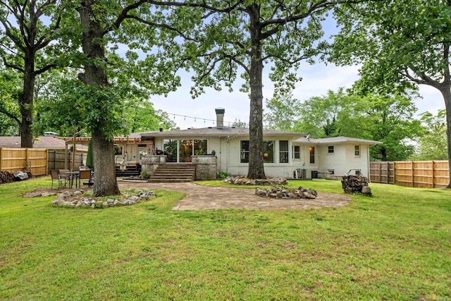 308 Bellaire, Hot Springs, AR 71901 - rear view of property featuring a fenced backyard, a patio area, and a wooden deck