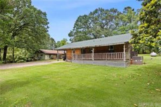 1440 N Shore Rd, Atkins, AR 72823 - rear view of property with a yard