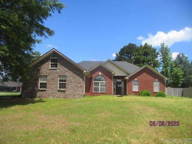 view of front of house with stone siding