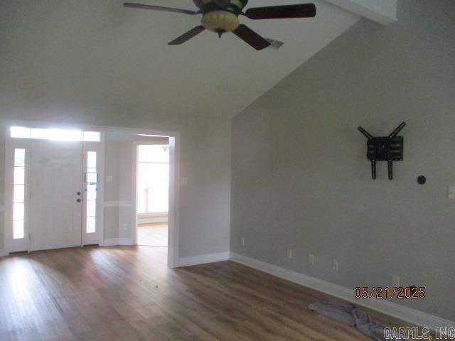 entrance foyer featuring a ceiling fan and wood finished floors