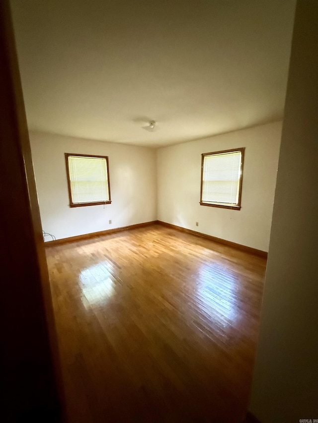 811 Hester St, Jonesboro, AR 72401 - unfurnished room featuring wood finished floors and baseboards