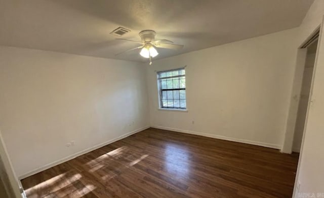 2 Concord Dr, Conway, AR 72034 - unfurnished bedroom featuring dark wood-type flooring and a ceiling fan