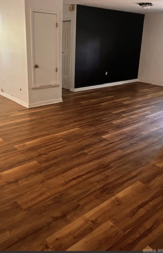 2 Concord Dr, Conway, AR 72034 - spare room with dark wood-type flooring and baseboards