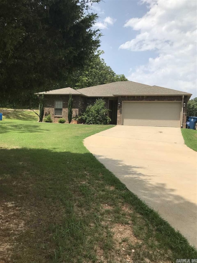 8211 Springhill Rd, Alexander, AR 72002 - view of front of house featuring driveway, an attached garage, brick siding, and a front lawn