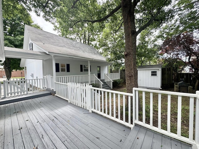 118 Lancaster, Mountain View, AR 72560 - wooden deck featuring a storage shed