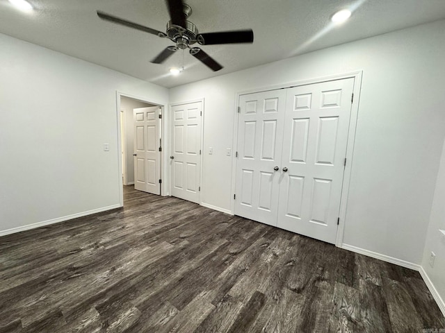 118 Lancaster, Mountain View, AR 72560 - unfurnished bedroom featuring dark wood-style flooring and a ceiling fan