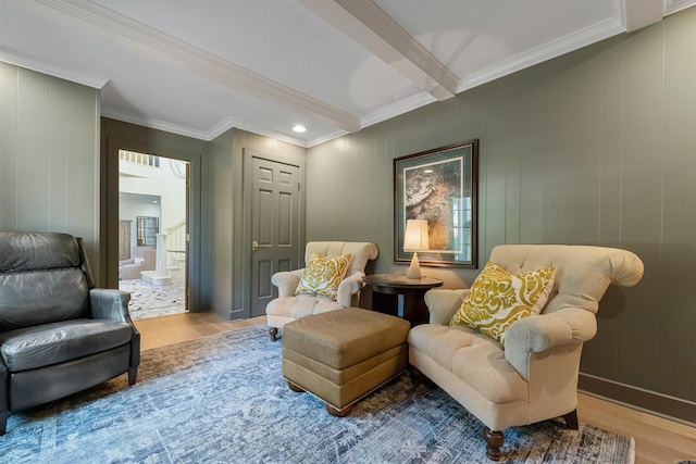 2904 Justin Matthews, North Little Rock, AR 72116 - sitting room featuring wood finished floors, ornamental molding, beam ceiling, and a decorative wall