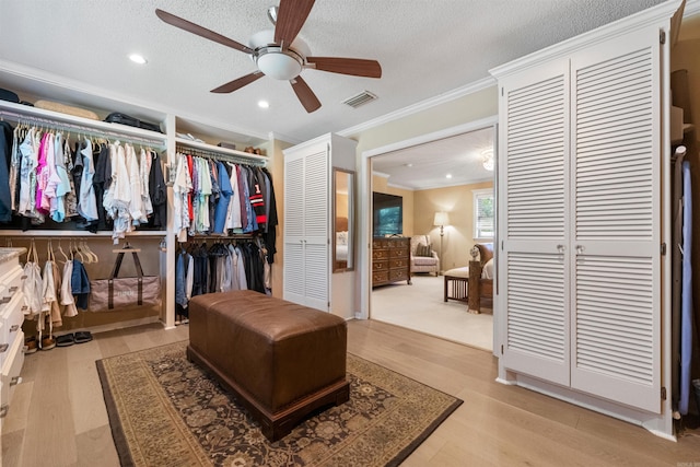 2904 Justin Matthews, North Little Rock, AR 72116 - spacious closet with ceiling fan and light wood-type flooring