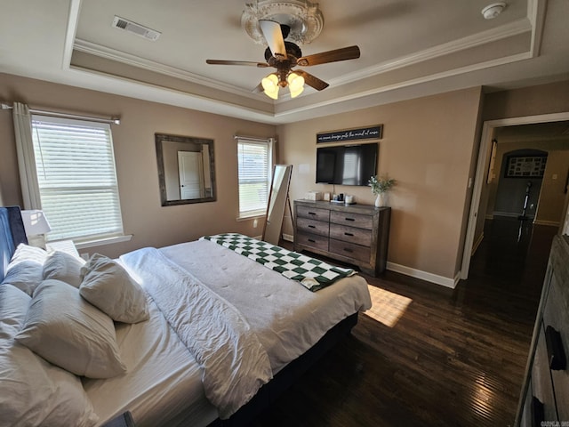 15 Marlin Dr, Austin, AR 72007 - bedroom with a tray ceiling, dark wood-type flooring, ornamental molding, and a ceiling fan