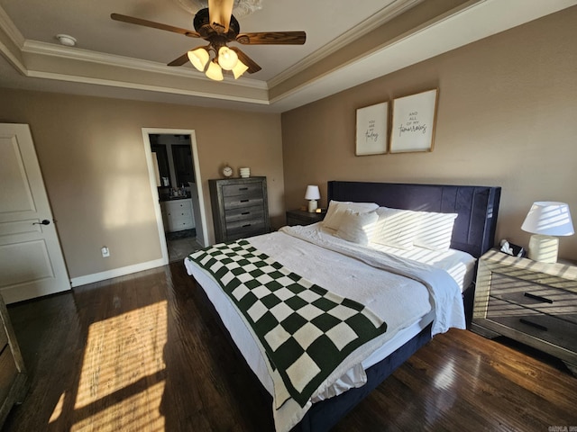 15 Marlin Dr, Austin, AR 72007 - bedroom with a raised ceiling, ornamental molding, dark wood-style floors, ensuite bathroom, and a ceiling fan