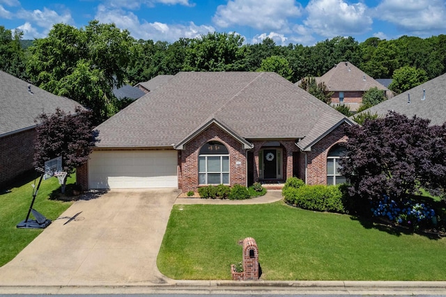 112 Holland Ln, Little Rock, AR 72223 - view of front of property featuring brick siding, driveway, an attached garage, and roof with shingles