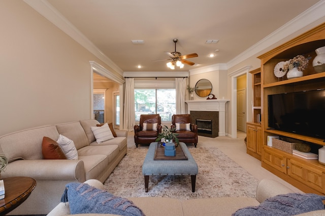 112 Holland Ln, Little Rock, AR 72223 - living area featuring ornamental molding, ceiling fan, a glass covered fireplace, recessed lighting, and light colored carpet