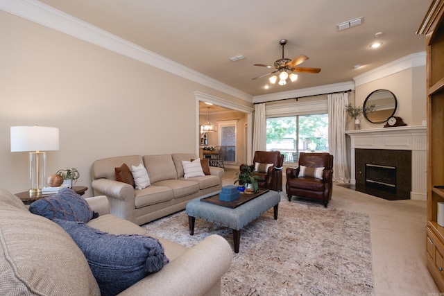 112 Holland Ln, Little Rock, AR 72223 - living room featuring light colored carpet, ornamental molding, ceiling fan, and a fireplace with flush hearth
