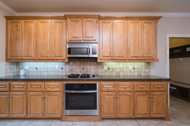 112 Holland Ln, Little Rock, AR 72223 - kitchen featuring appliances with stainless steel finishes, ornamental molding, backsplash, brown cabinets, and light tile patterned flooring