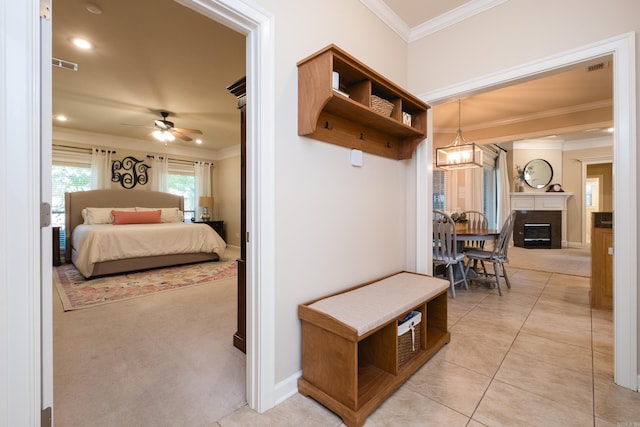 112 Holland Ln, Little Rock, AR 72223 - mudroom with ornamental molding, a ceiling fan, recessed lighting, a glass covered fireplace, and light tile patterned flooring