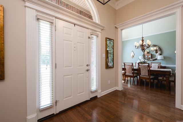 112 Holland Ln, Little Rock, AR 72223 - entryway with dark wood-style flooring, plenty of natural light, a chandelier, and crown molding