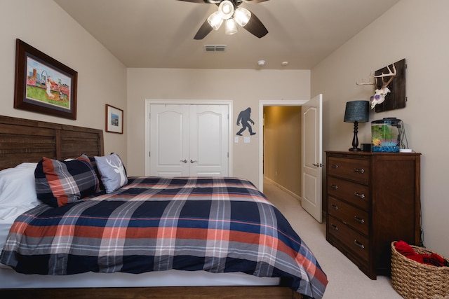 112 Holland Ln, Little Rock, AR 72223 - bedroom with light carpet, a ceiling fan, and a closet