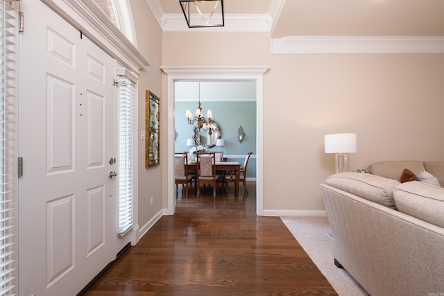 112 Holland Ln, Little Rock, AR 72223 - foyer featuring ornamental molding, a chandelier, and dark wood-style floors