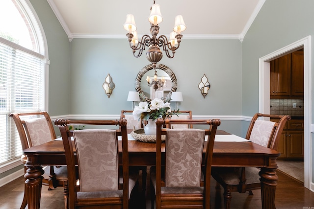 112 Holland Ln, Little Rock, AR 72223 - dining space with a chandelier, ornamental molding, healthy amount of natural light, and wood finished floors