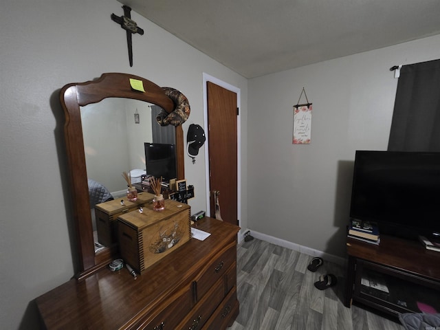 109 S Adams St, Mena, AR 71953 - home office with wood finished floors and baseboards