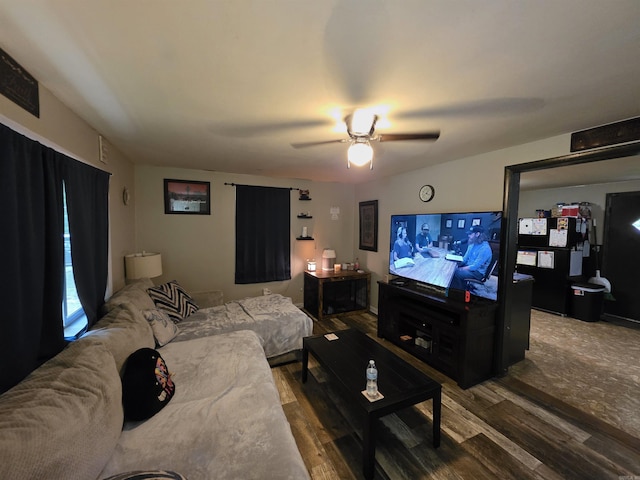 109 S Adams St, Mena, AR 71953 - living room featuring wood finished floors and ceiling fan