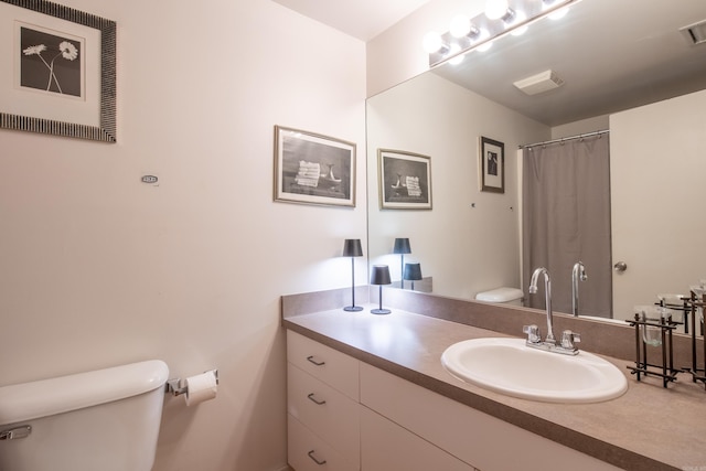 423 E 3rd St Unit 218, Little Rock, AR 72201 - full bathroom with toilet and vanity
