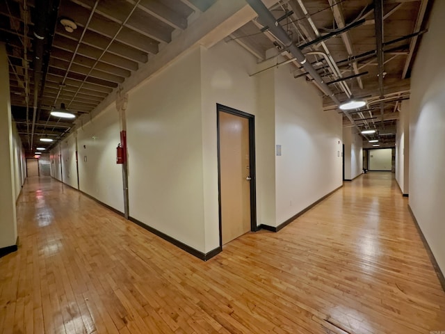 423 E 3rd St Unit 218, Little Rock, AR 72201 - hall featuring light wood-type flooring and baseboards