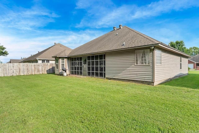 3612 Lexee Dr, Jonesboro, AR 72404 - back of house featuring a sunroom and roof with shingles