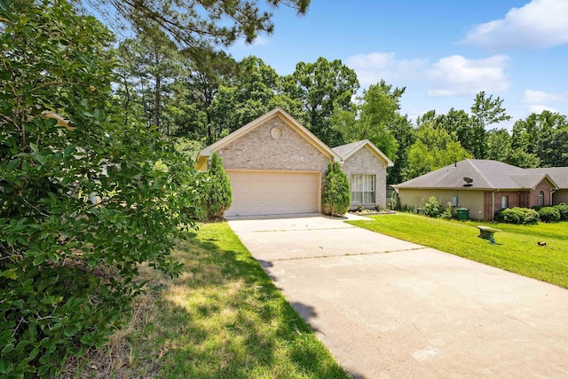 1228 Ridgecrest Dr, Benton, AR 72015 - view of front of property featuring brick siding, a front lawn, concrete driveway, and an attached garage