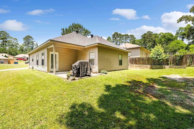 1228 Ridgecrest Dr, Benton, AR 72015 - rear view of property featuring a patio and a shingled roof
