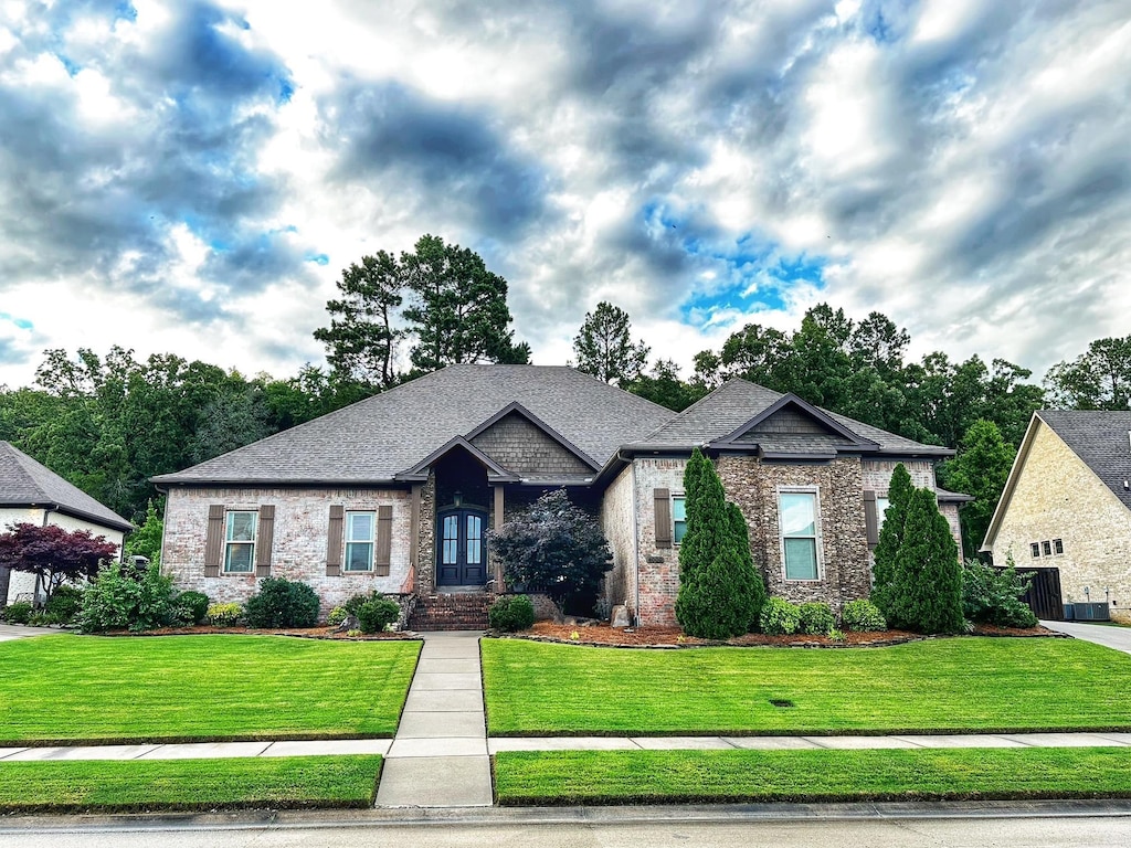 4000 Riley Renee Cv, Conway, AR 72034 - view of front of house with a front yard and brick siding