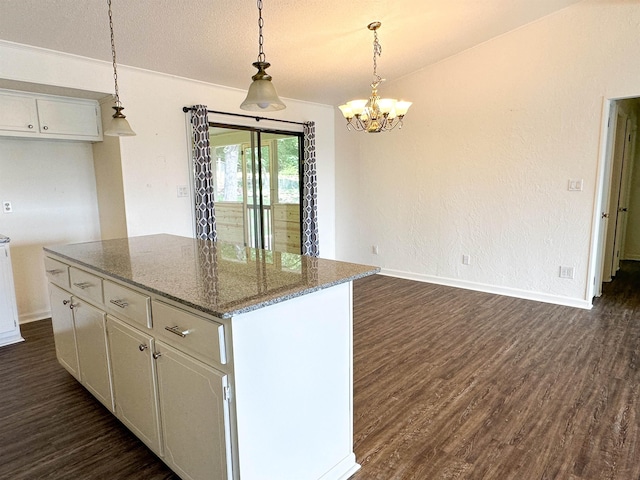 1502 E Emerald Cove Dr, Horseshoe Bend, AR 72512 - kitchen featuring dark wood-style flooring, a chandelier, white cabinets, pendant lighting, and a center island