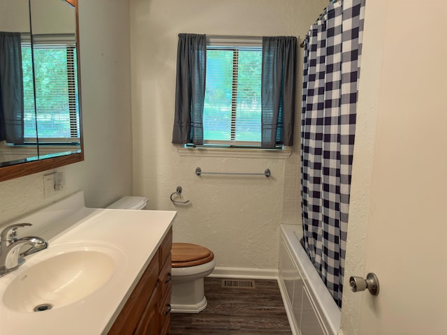 1502 E Emerald Cove Dr, Horseshoe Bend, AR 72512 - bathroom with wood finished floors, a textured wall, vanity, and shower / bathtub combination with curtain