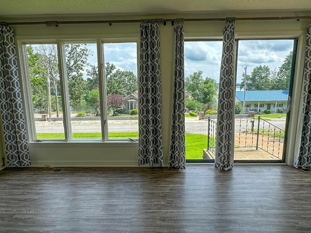 1502 E Emerald Cove Dr, Horseshoe Bend, AR 72512 - unfurnished room featuring wood finished floors
