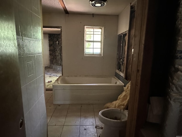 17811 Puckett Rd, Alexander, AR 72002 - bathroom with a bathtub and tile patterned floors