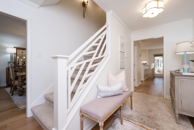7 Shawbridge Ln, Little Rock, AR 72212 - staircase featuring ornamental molding and wood finished floors