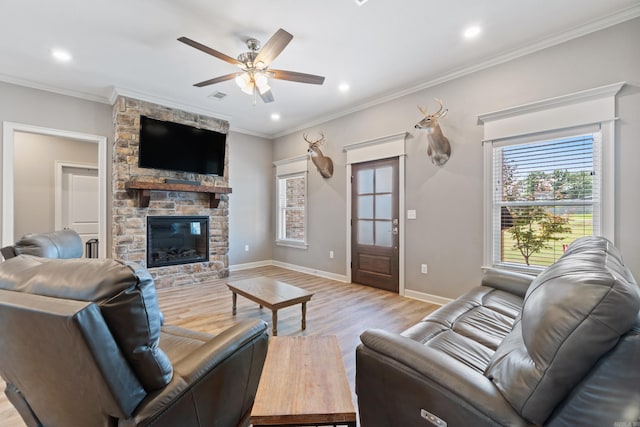 26 Edward Way, Greenbrier, AR 72058 - living room with light wood-style floors, ceiling fan, ornamental molding, a fireplace, and recessed lighting