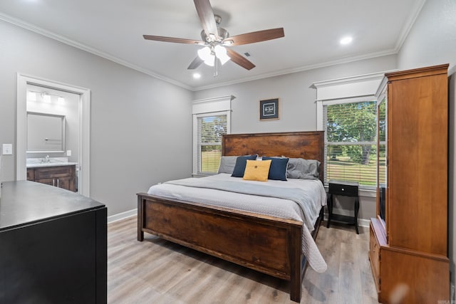 26 Edward Way, Greenbrier, AR 72058 - bedroom with light wood-style flooring, multiple windows, crown molding, connected bathroom, and recessed lighting